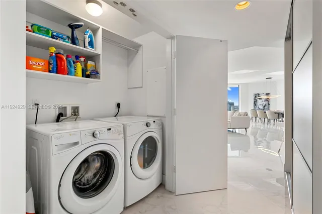 a living room with furniture and a chair