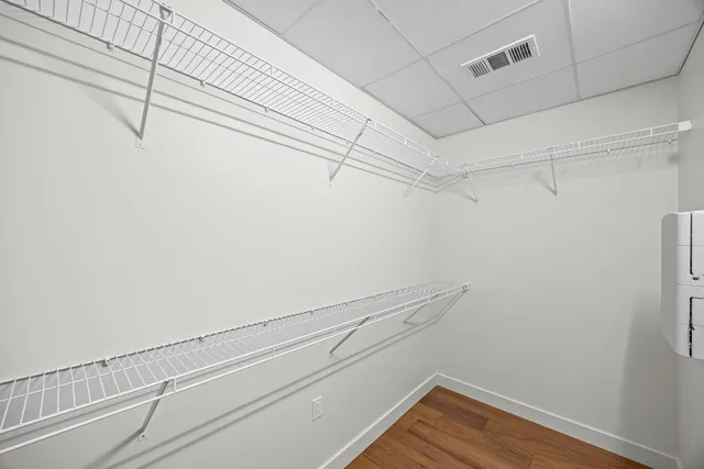 a view of a room with racks on the wall