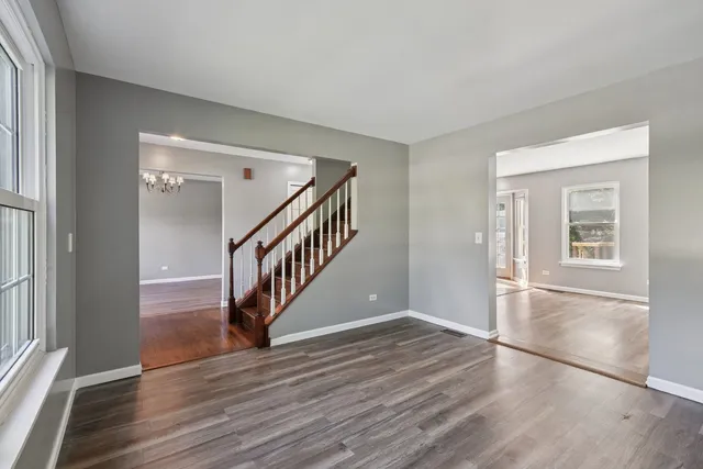 a view of entryway with wooden floor
