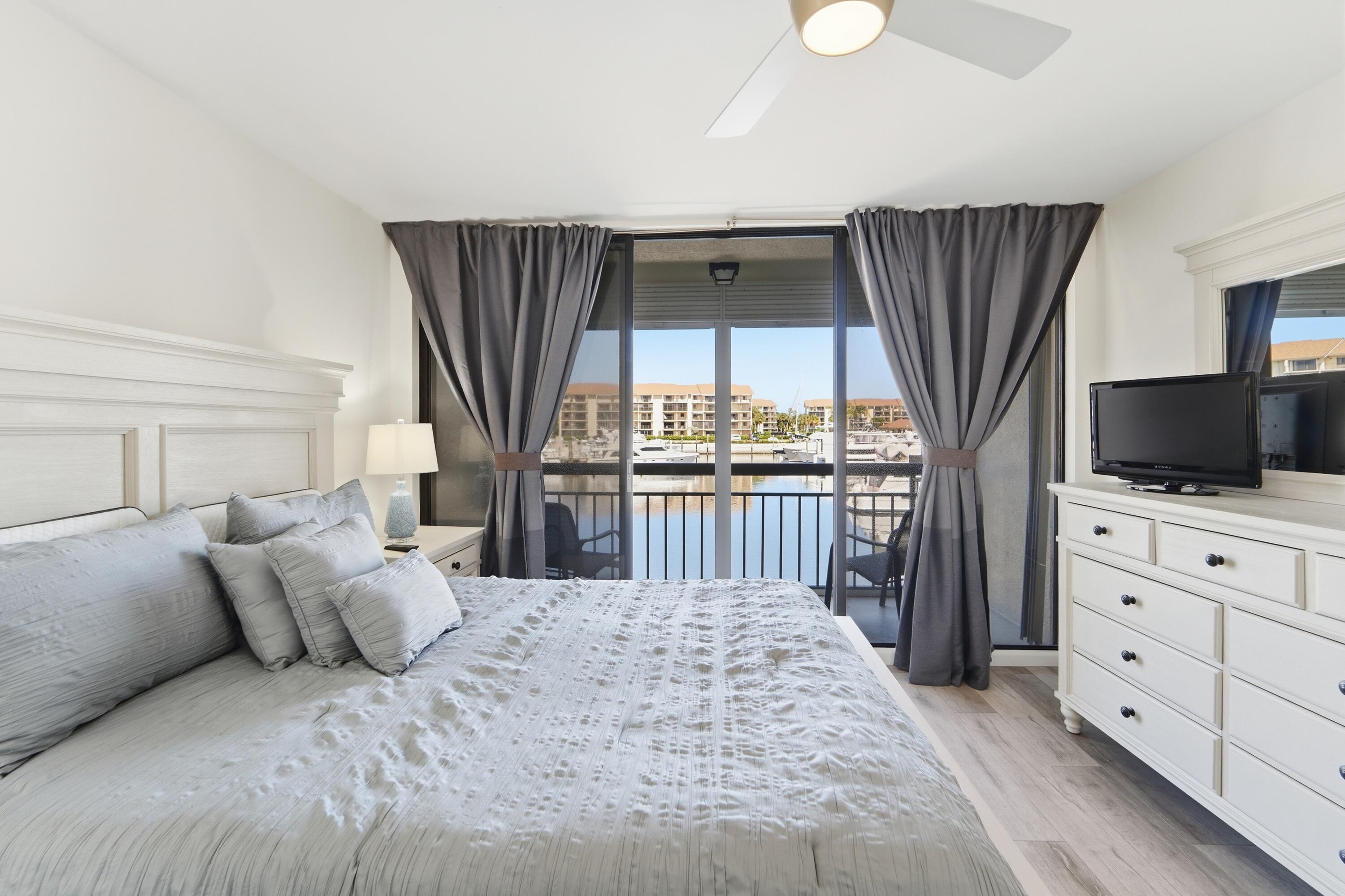 2501 Marina Isle Way, Unit 203 Jupiter, FL 33477 - Photo 23 of 67 Main Bedroom