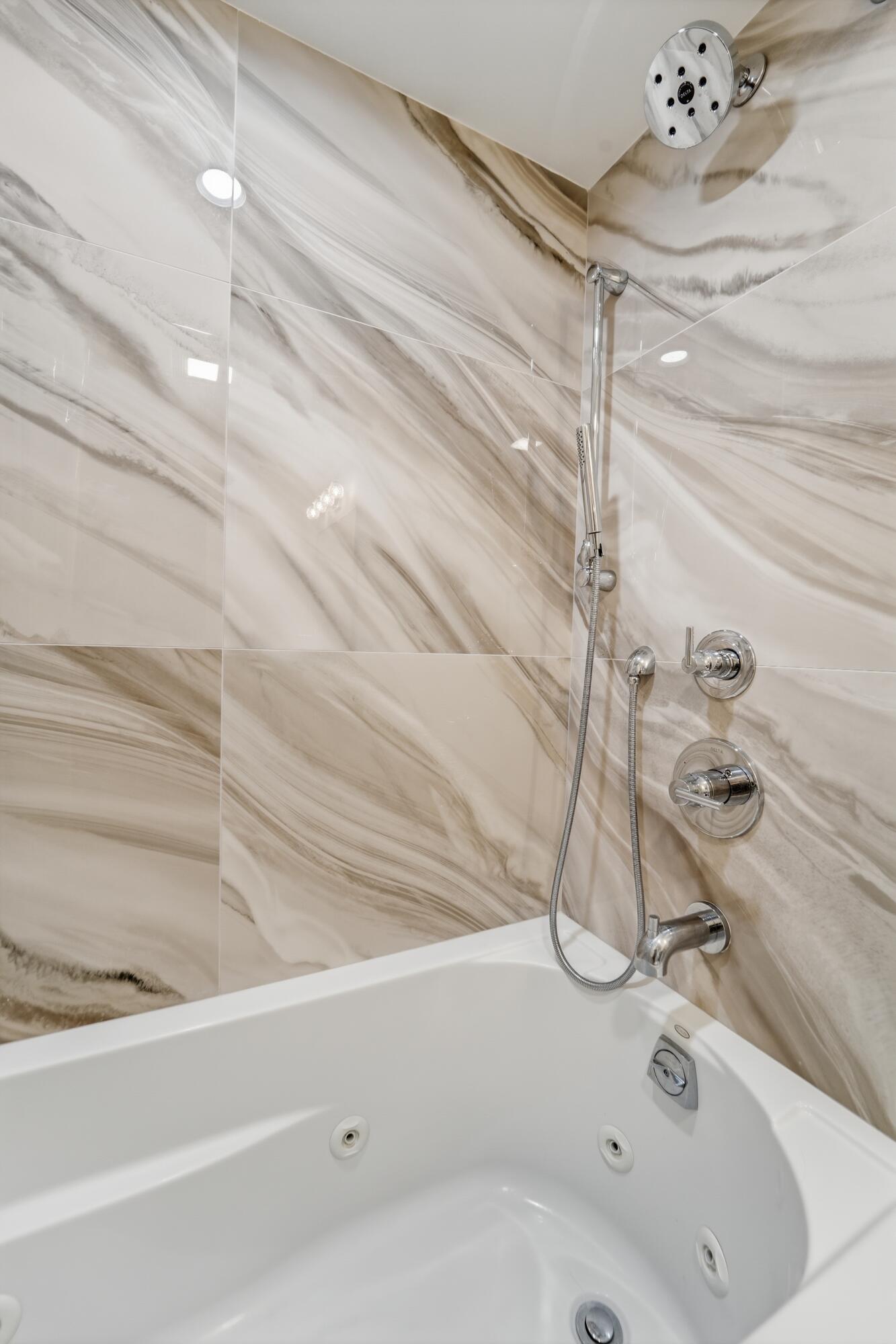 2501 Marina Isle Way, Unit 203 Jupiter, FL 33477 - Photo 35 of 67 Guest Bath