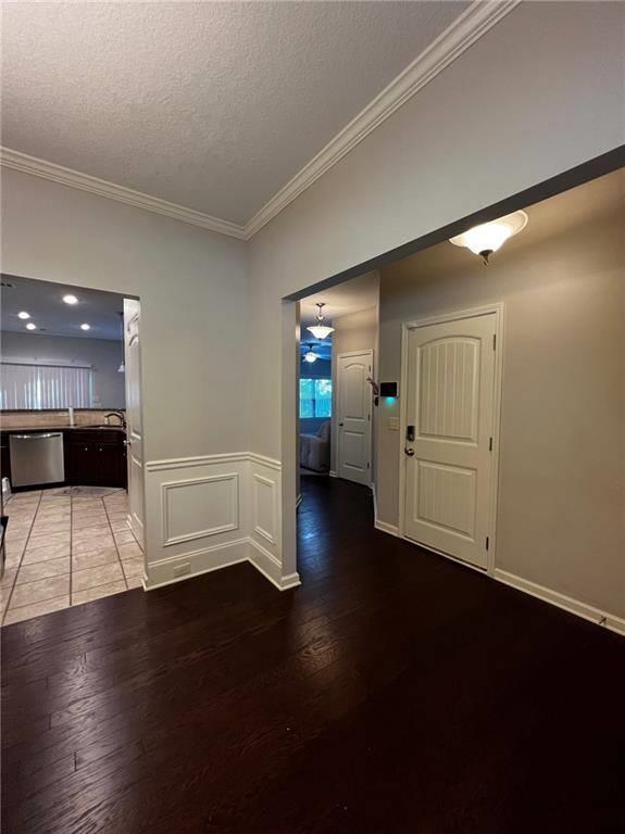 7426 Sorrel Court Columbus, GA 31909 - Photo 11 of 23 a view of empty room with wooden floor and windows