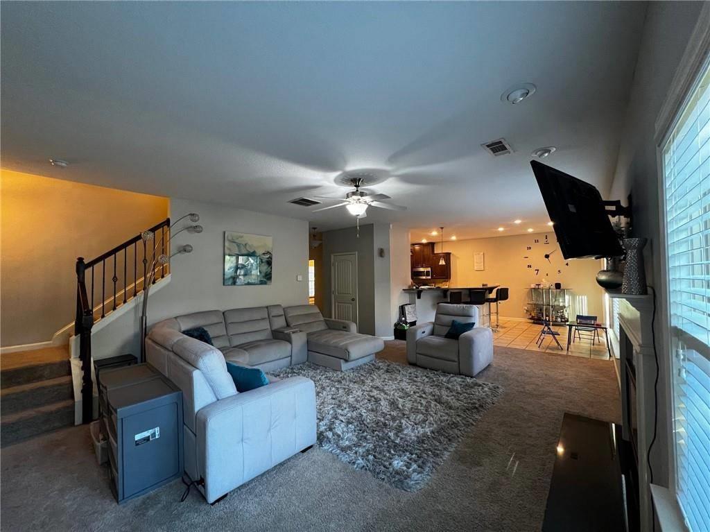 7426 Sorrel Court Columbus, GA 31909 - Photo 13 of 23 a living room with furniture and a flat screen tv
