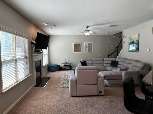 a view of hallway with wooden floor