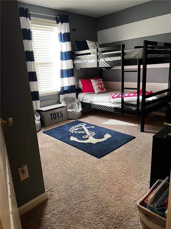 7426 Sorrel Court Columbus, GA 31909 - Photo 16 of 23 a living room with lots of furniture and a rug