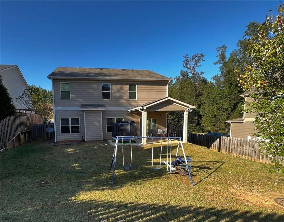 7426 Sorrel Court Columbus, GA 31909 - Photo 7 of 23 a view of a house with backyard porch and sitting area
