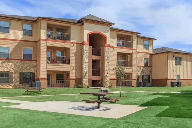 a brick building with a lots of windows in it