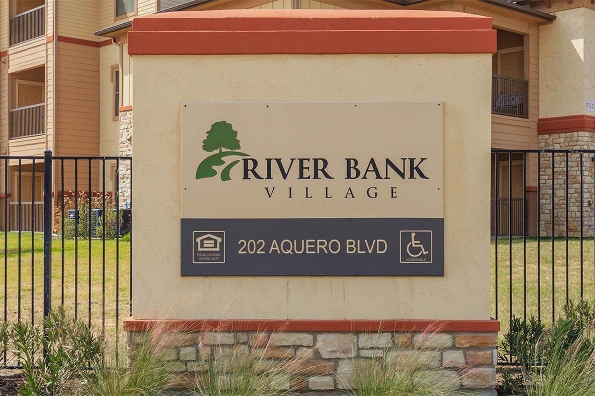 202 Aquero Boulevard Laredo, TX 78045 - Photo 6 of 9 a wall with a sign on it