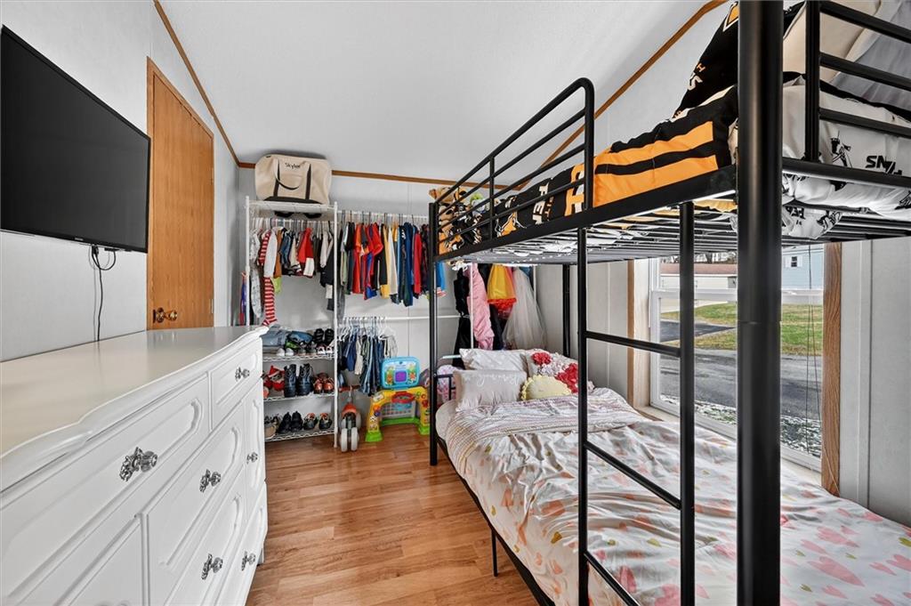 640 Deana Way Rochester, PA 15074 - Photo 13 of 20 a bedroom with furniture and a flat tv screen