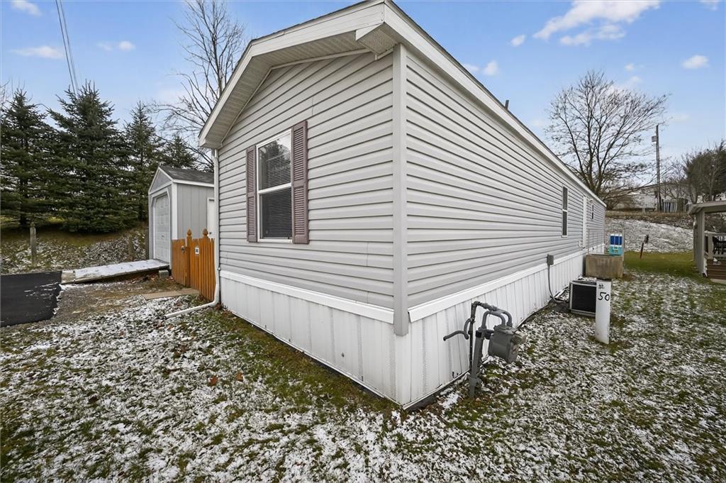 640 Deana Way Rochester, PA 15074 - Photo 2 of 20 a view of a house with a yard and a chair