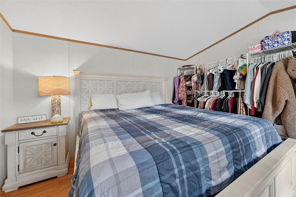 640 Deana Way Rochester, PA 15074 - Photo 10 of 20 a bedroom with a large bed and a walk in closet