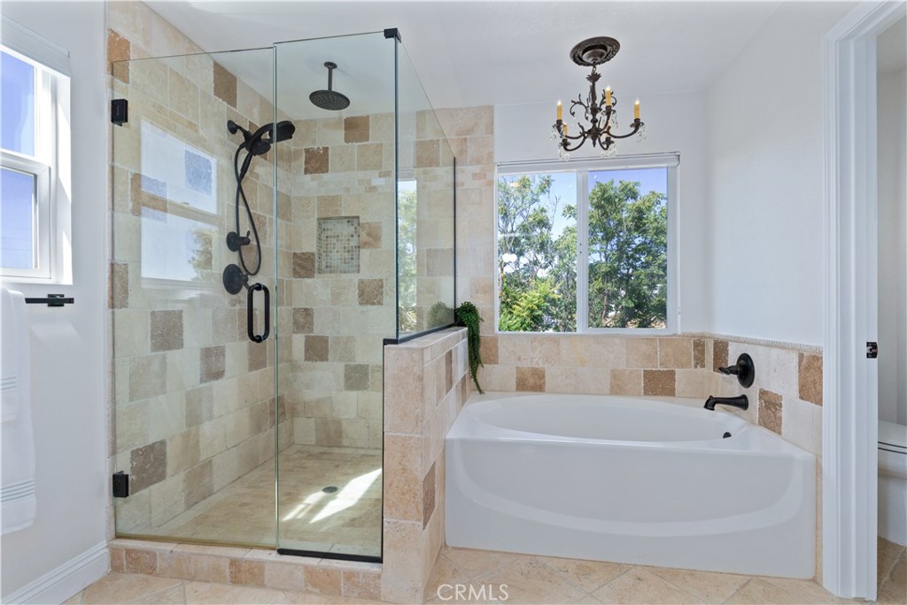 142 Via Camelia Paso Robles, CA 93446 - Photo 21 of 43 a bathroom with a bathtub and shower