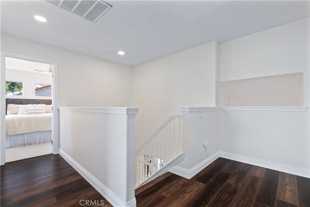 142 Via Camelia Paso Robles, CA 93446 - Photo 24 of 43 a view of an entryway with wooden floor