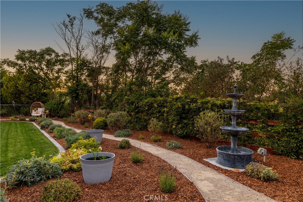 142 Via Camelia Paso Robles, CA 93446 - Photo 36 of 43 a view of a backyard with chair