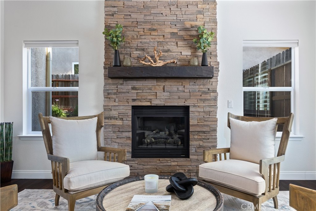 142 Via Camelia Paso Robles, CA 93446 - Photo 4 of 43 a living room with furniture and a fireplace
