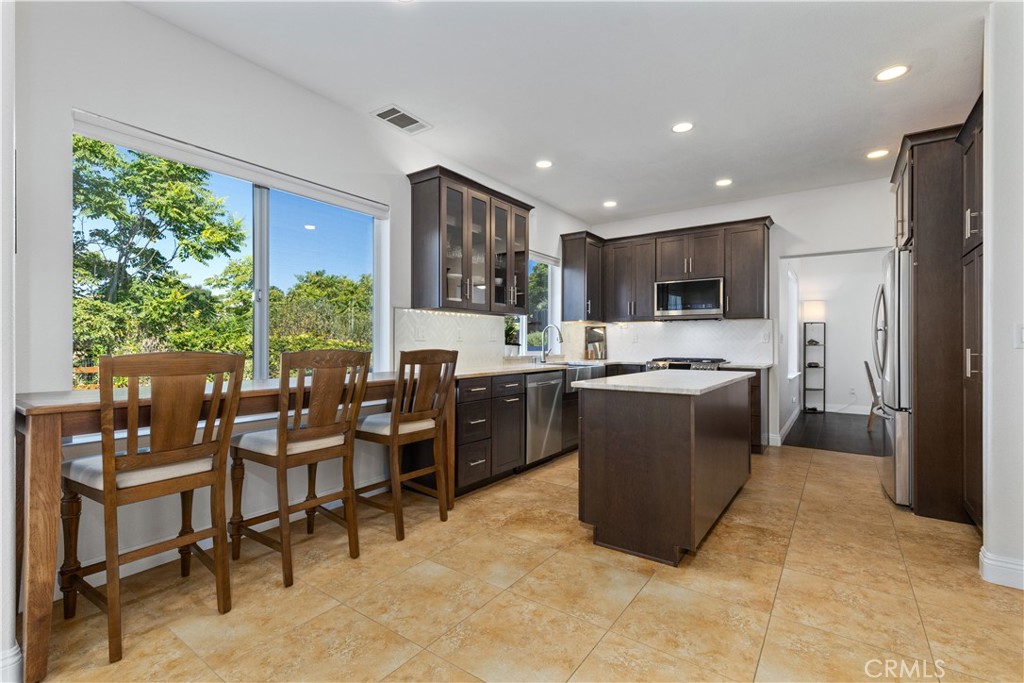 142 Via Camelia Paso Robles, CA 93446 - Photo 10 of 43 a kitchen with a cabinets and a counter top space