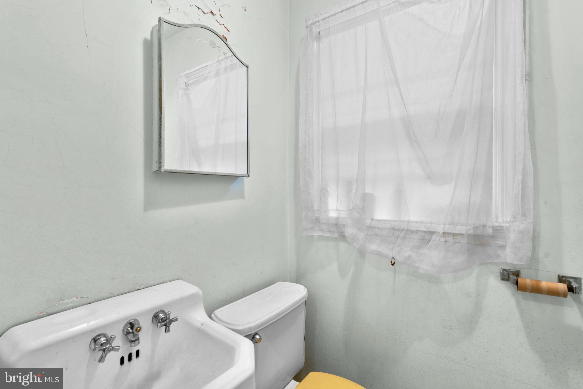 6824 Campfield Road Gwynn Oak, MD 21207 - Photo 13 of 40 Main Level Powder Bath