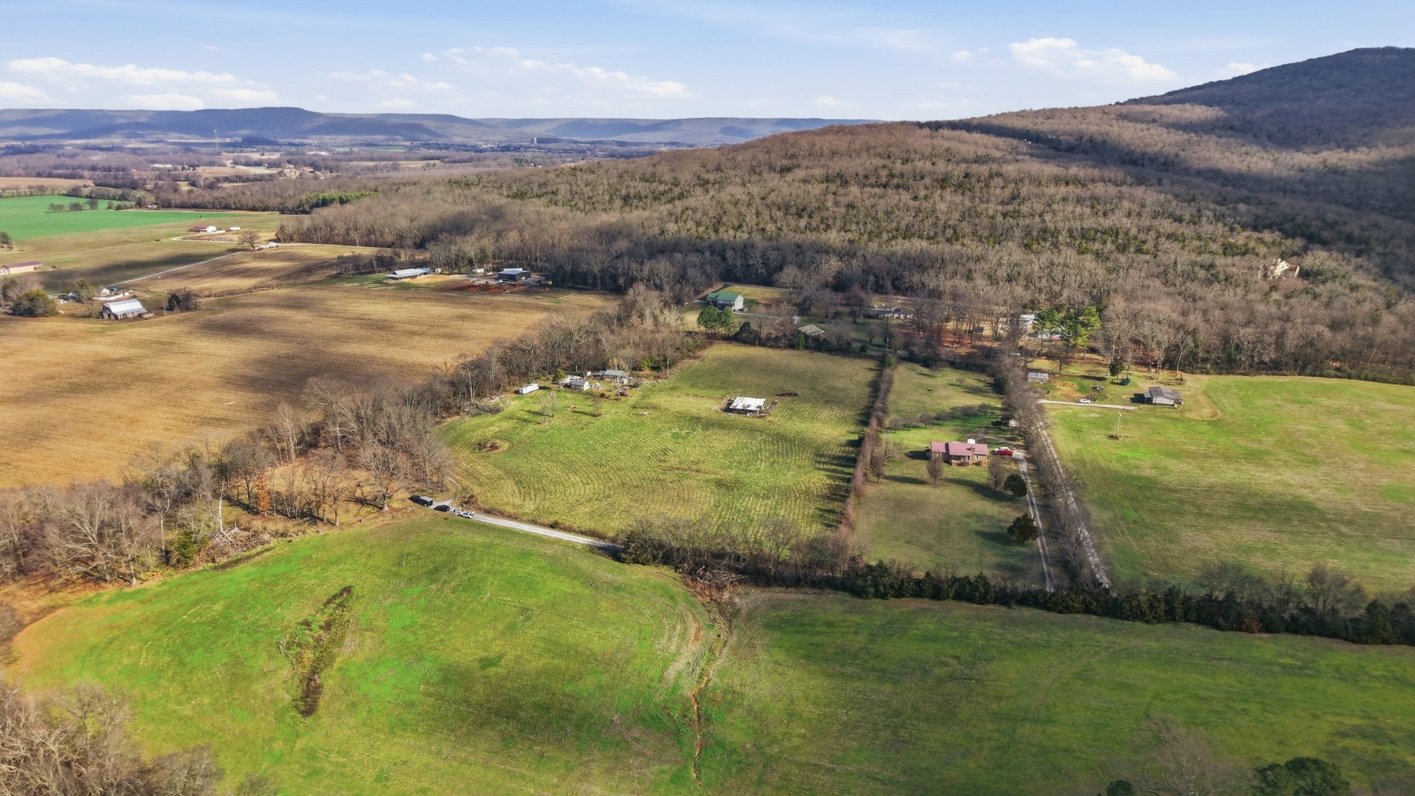 640 Dotson Cemetery Road Decherd, TN 37324 - Photo 16 of 18 a view of a town with mountains in the background