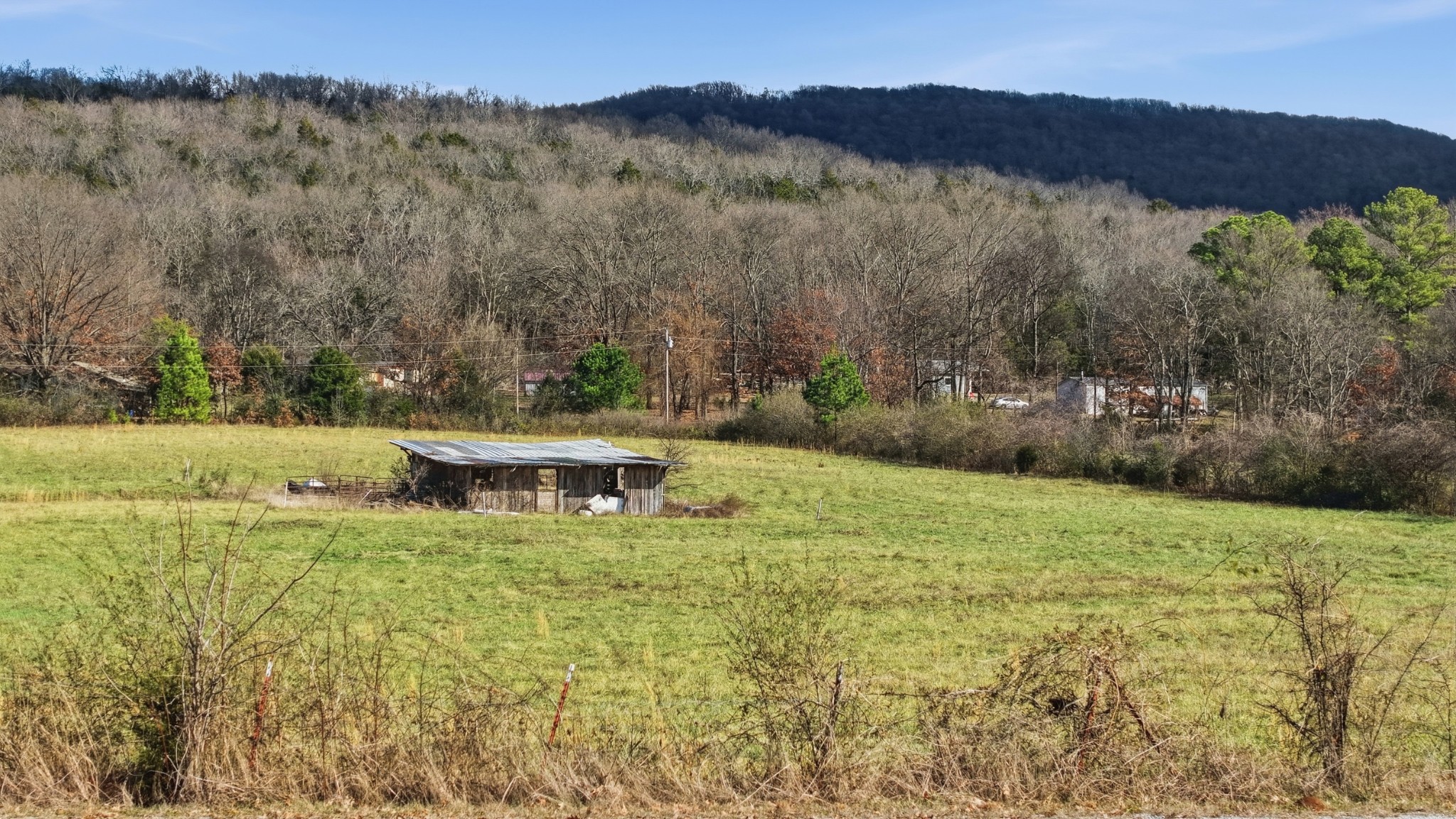 640 Dotson Cemetery Road Decherd, TN 37324 - Photo 18 of 18 a view of a mountain with an outdoor space and seating