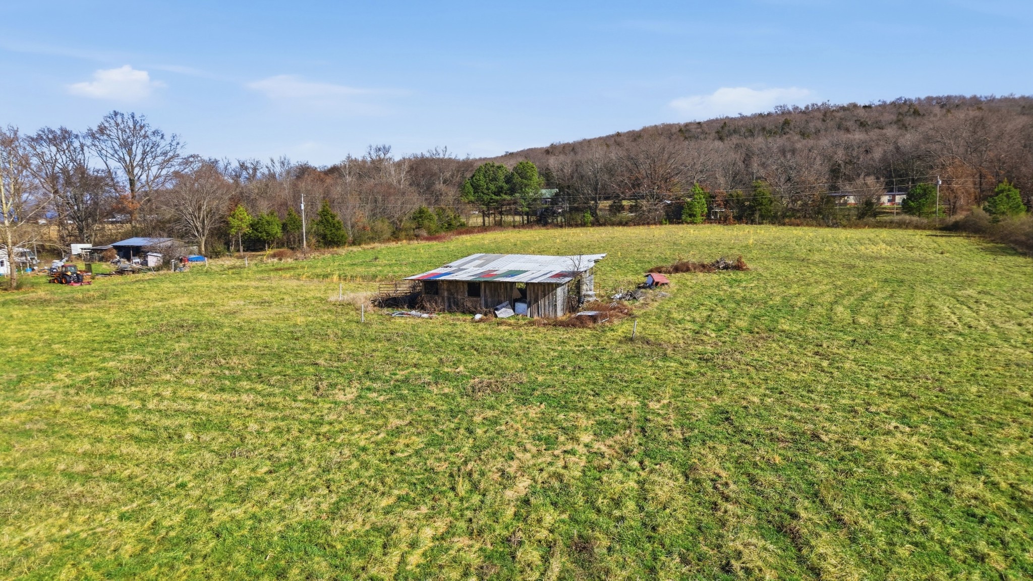 640 Dotson Cemetery Road Decherd, TN 37324 - Photo 8 of 18 a view of a green field with trees