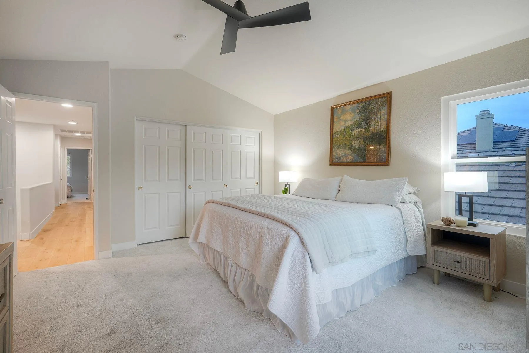 529 Peach Tree Way San Marcos, CA 92069 - Photo 16 of 30 a bedroom with a bed and a painting on the wall