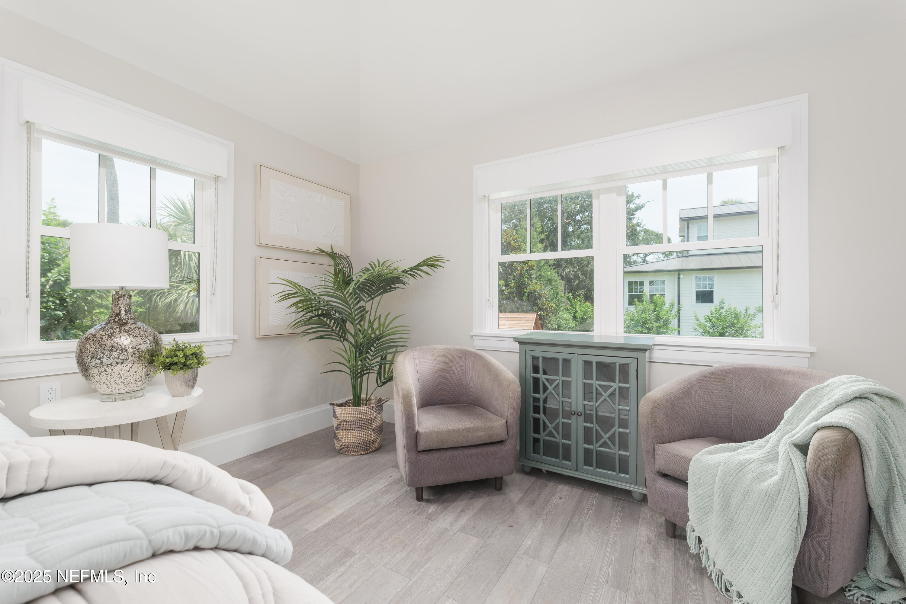 365 8th Street Atlantic Beach, FL 32233 - Photo 24 of 65 a living room with furniture and a potted plant