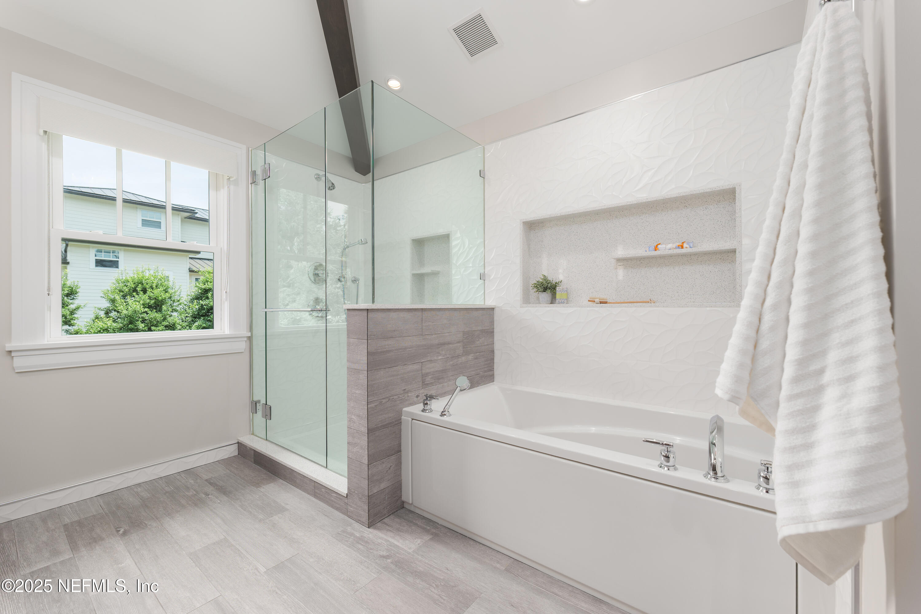 365 8th Street Atlantic Beach, FL 32233 - Photo 27 of 65 a bathroom with a bathtub and a shower