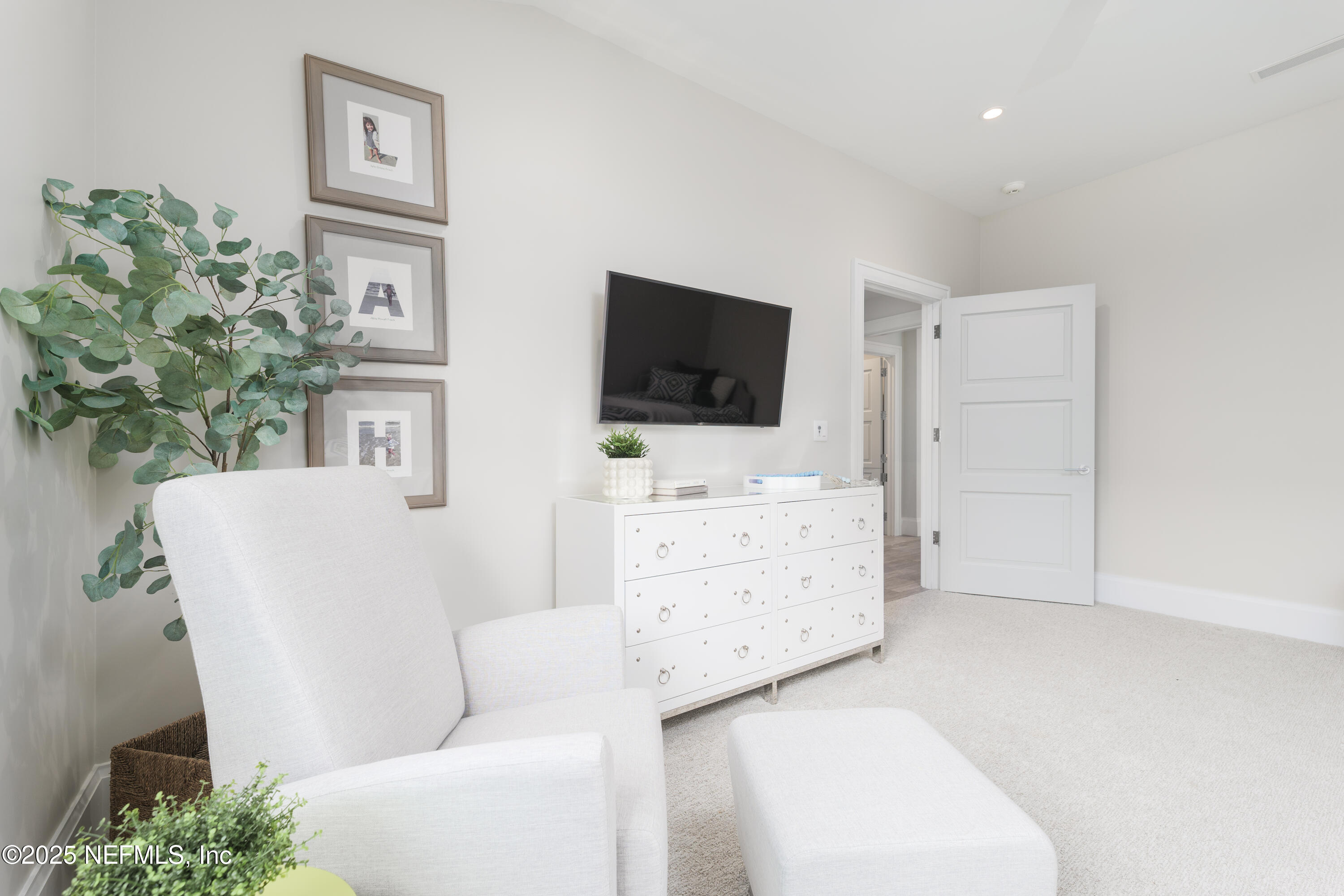 365 8th Street Atlantic Beach, FL 32233 - Photo 30 of 65 a living room with furniture and a flat screen tv