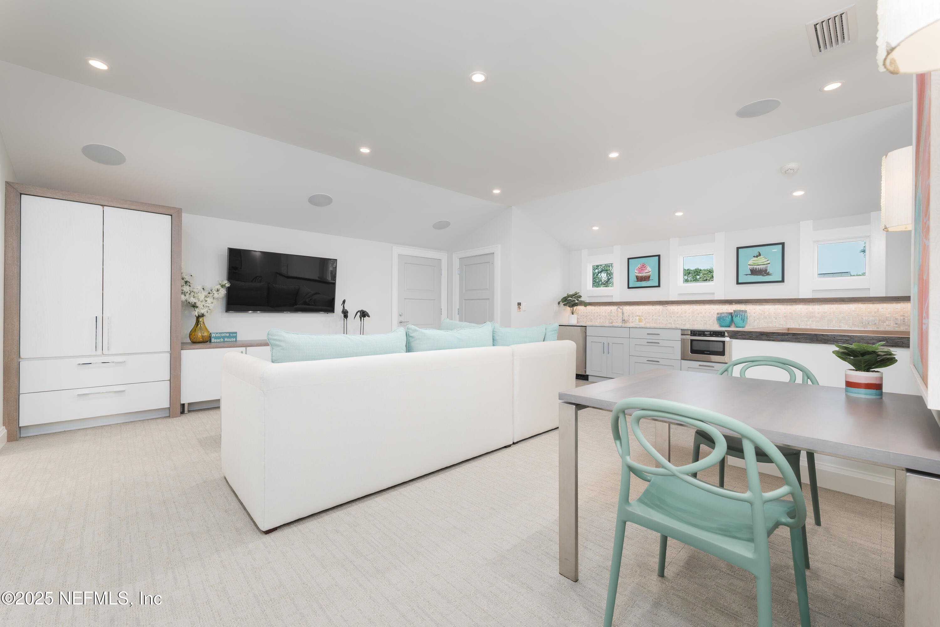365 8th Street Atlantic Beach, FL 32233 - Photo 38 of 65 a living room with stainless steel appliances furniture a dining table and kitchen view