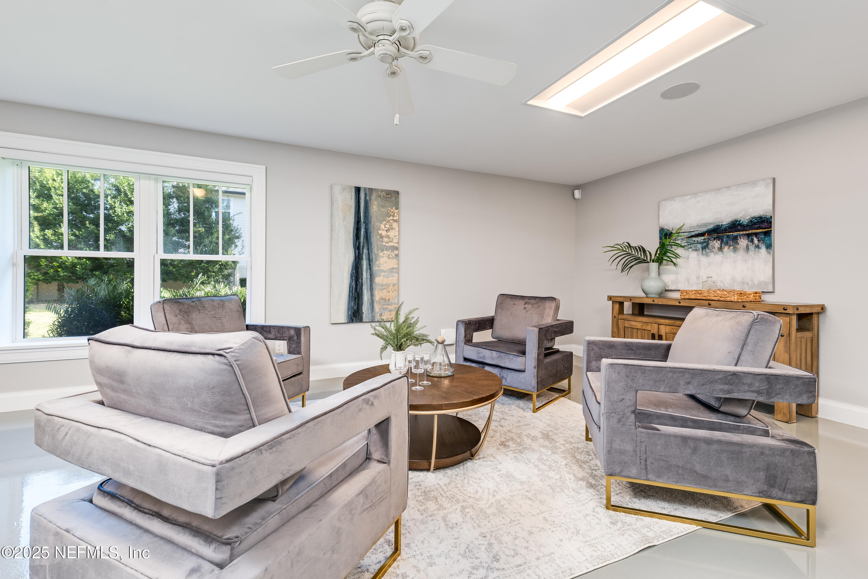 365 8th Street Atlantic Beach, FL 32233 - Photo 48 of 65 a living room with furniture and a large window