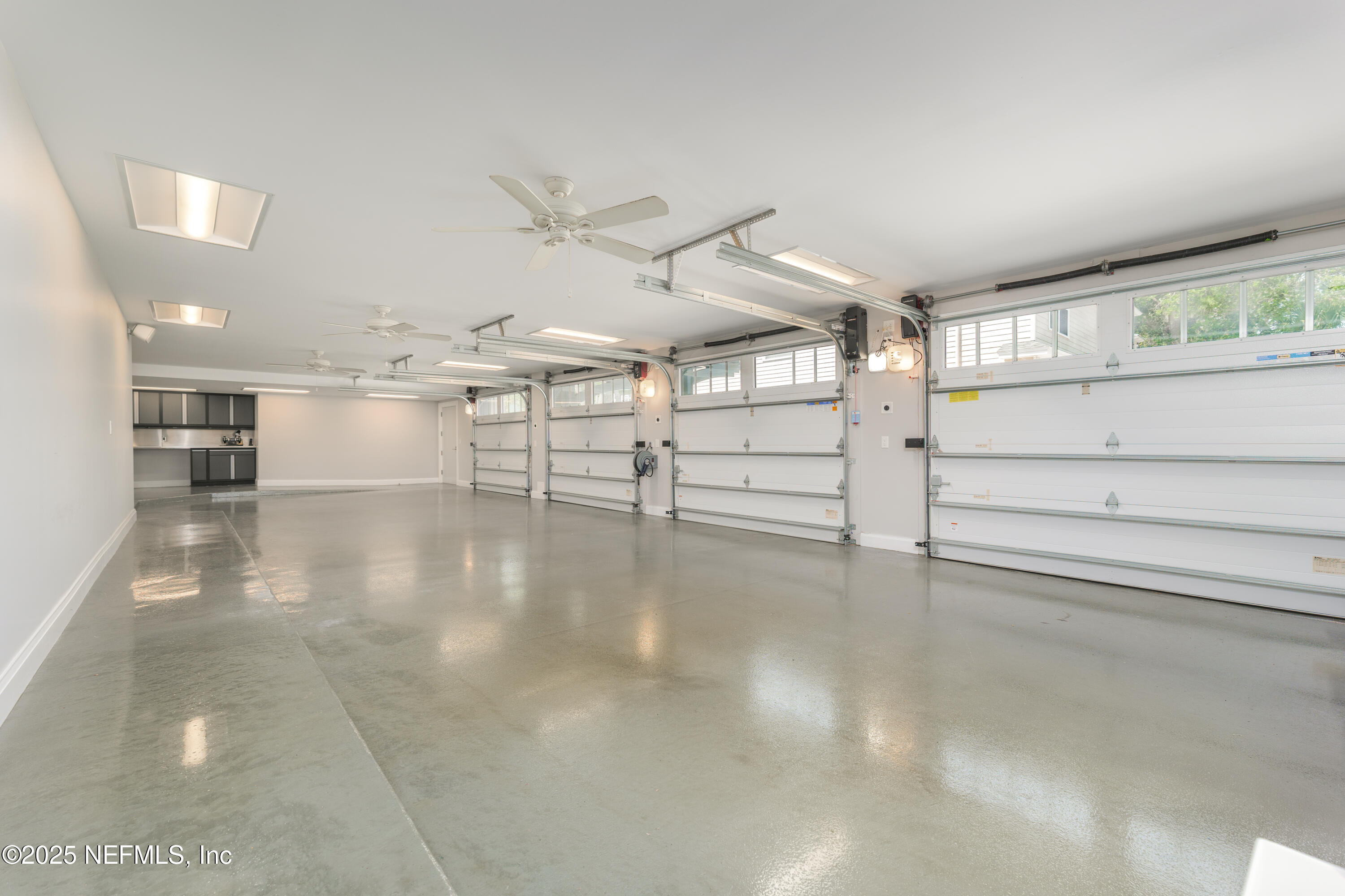 365 8th Street Atlantic Beach, FL 32233 - Photo 53 of 65 a view of a livingroom with an empty space and a ceiling fan