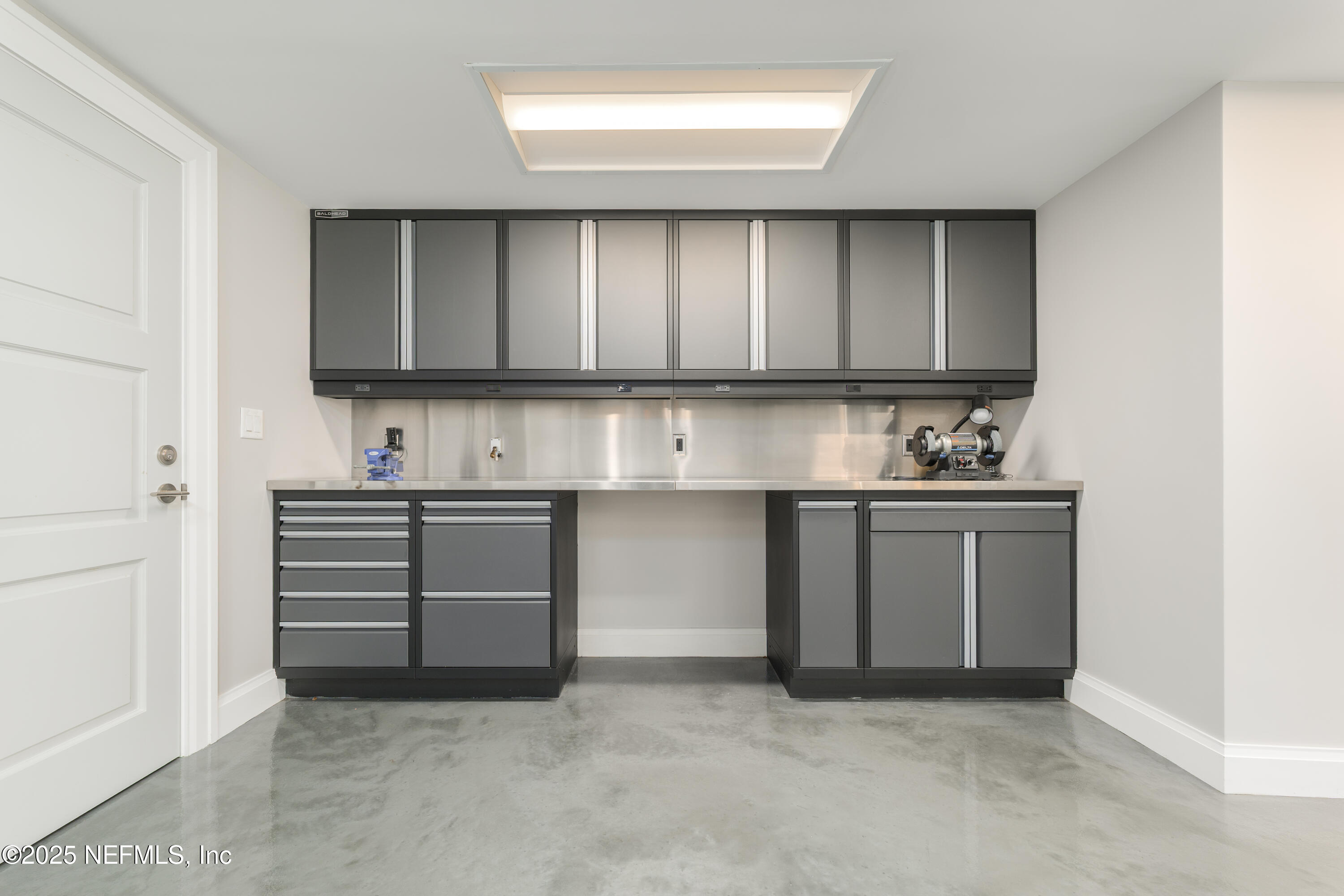 365 8th Street Atlantic Beach, FL 32233 - Photo 54 of 65 a kitchen with cabinets appliances and a window