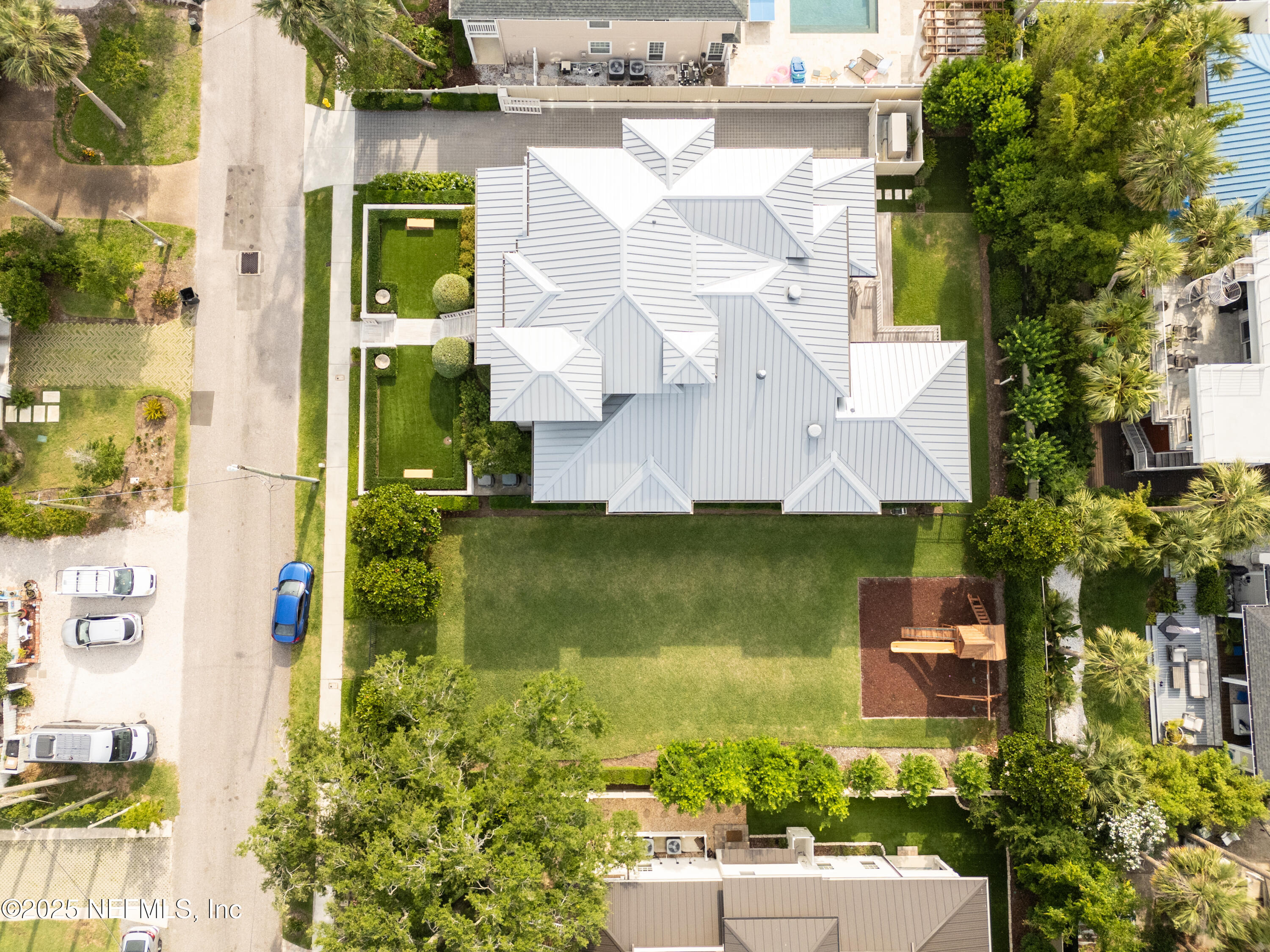 365 8th Street Atlantic Beach, FL 32233 - Photo 7 of 65 an aerial view of a house with a garden statue
