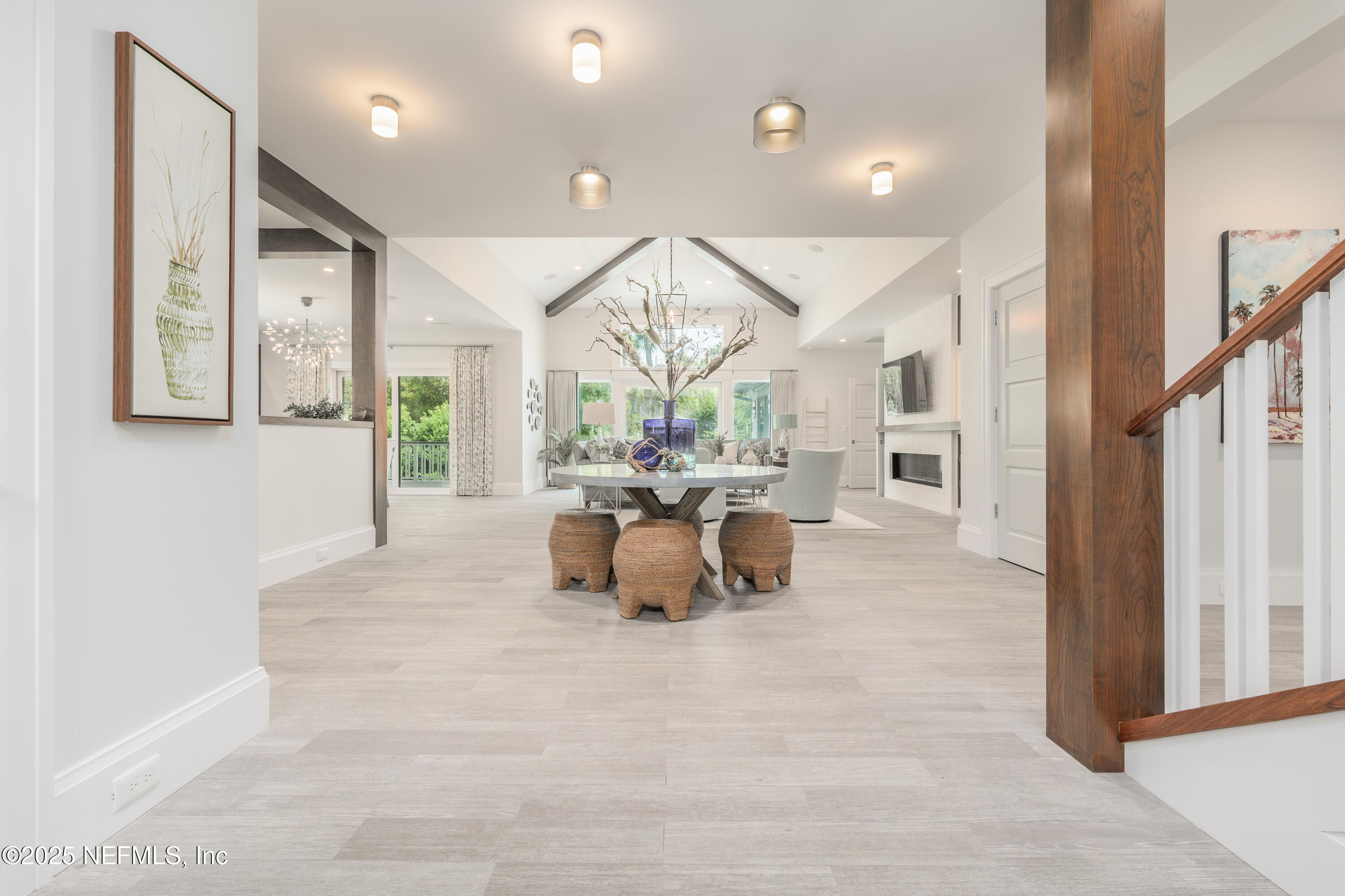 365 8th Street Atlantic Beach, FL 32233 - Photo 8 of 65 a very nice looking living room with a large window and chandelier