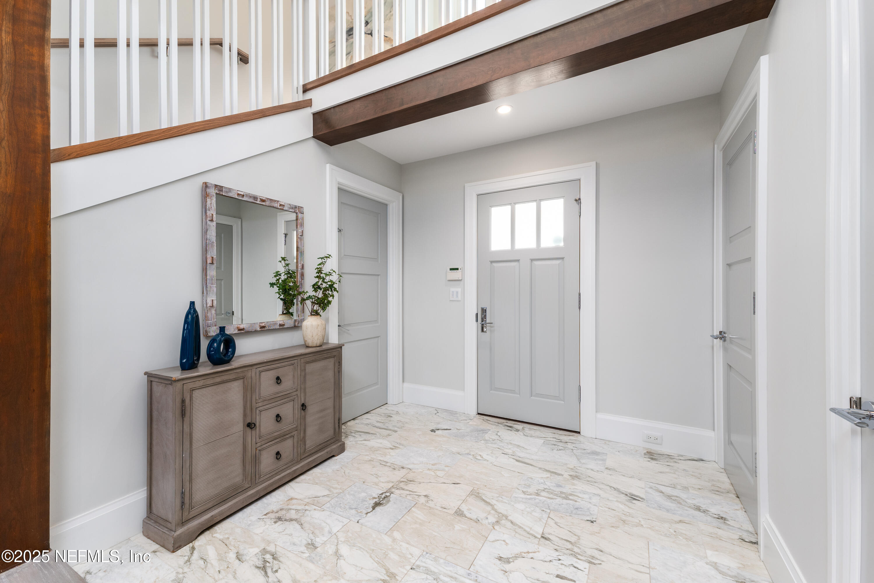 365 8th Street Atlantic Beach, FL 32233 - Photo 9 of 65 a spacious bathroom with a sink and a mirror