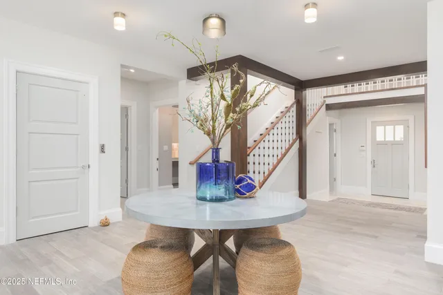 a kitchen with granite countertop a sink stainless steel appliances and cabinets