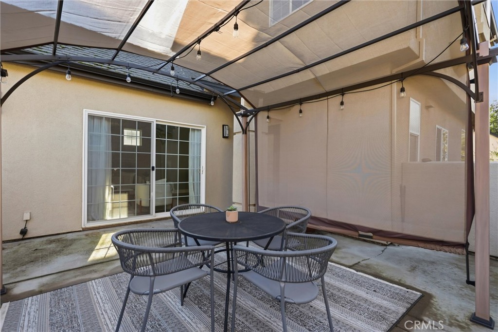 97 Benson Terrace Chico, CA 95928 - Photo 11 of 39 a backyard of a house with table and chairs