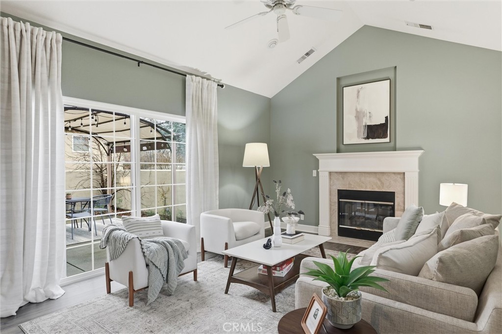 97 Benson Terrace Chico, CA 95928 - Photo 20 of 39 a living room with furniture and a fireplace