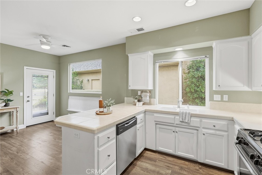 97 Benson Terrace Chico, CA 95928 - Photo 25 of 39 a kitchen with a sink stove and cabinets