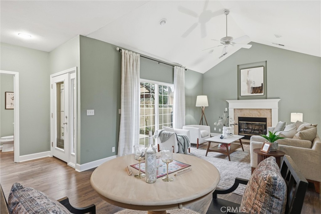 97 Benson Terrace Chico, CA 95928 - Photo 3 of 39 a living room with furniture and a fireplace