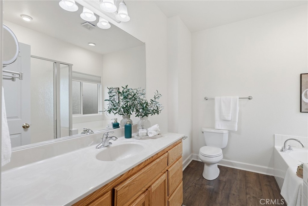 97 Benson Terrace Chico, CA 95928 - Photo 32 of 39 a bathroom with a sink a toilet and shower