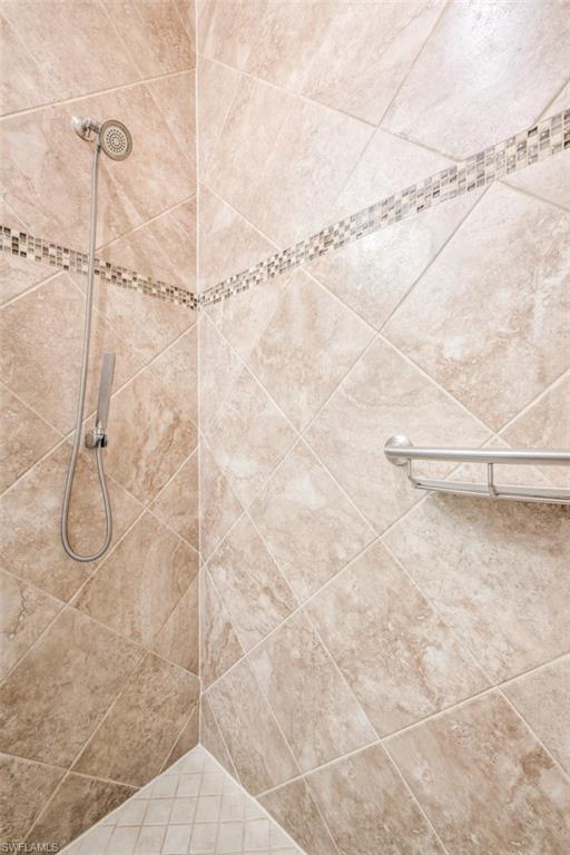 Undisclosed Address Naples, FL 34119 - Photo 24 of 32 a bathroom with a shower