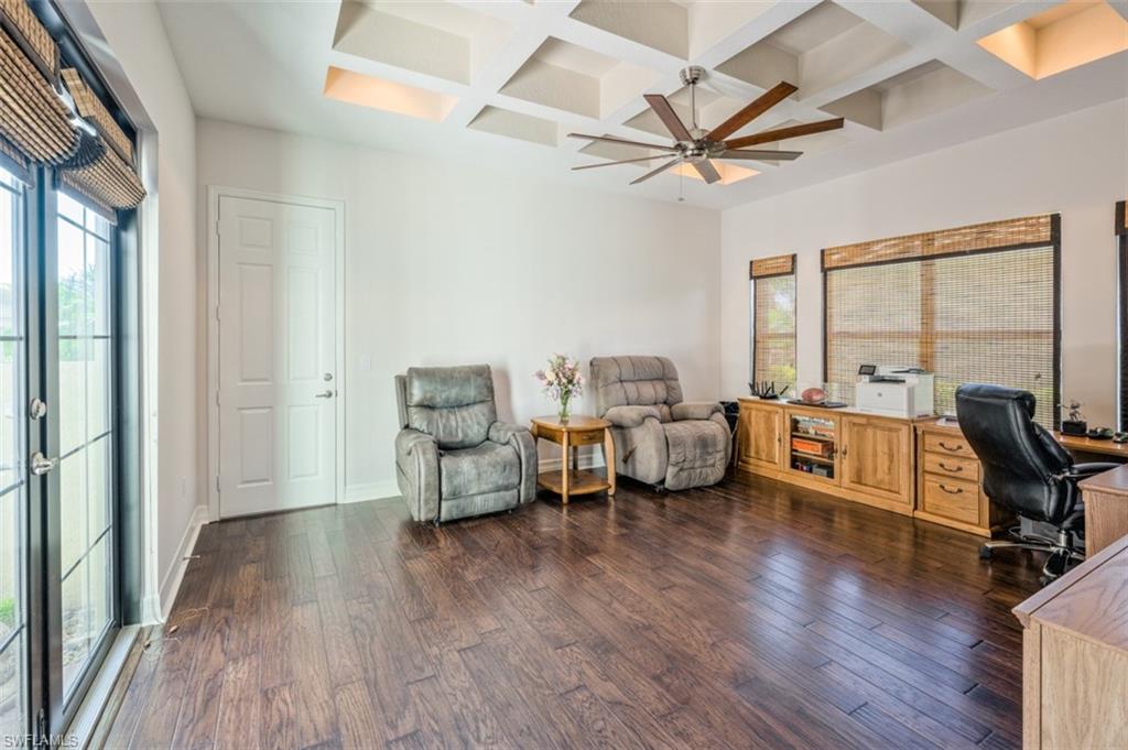 Undisclosed Address Naples, FL 34119 - Photo 26 of 32 a living room with furniture and a large window