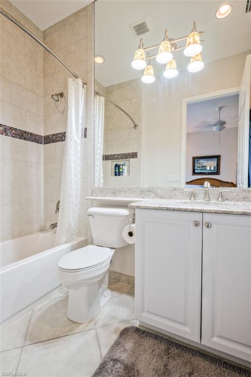 Undisclosed Address Naples, FL 34119 - Photo 28 of 32 a bathroom with a granite countertop sink a toilet and bathtub