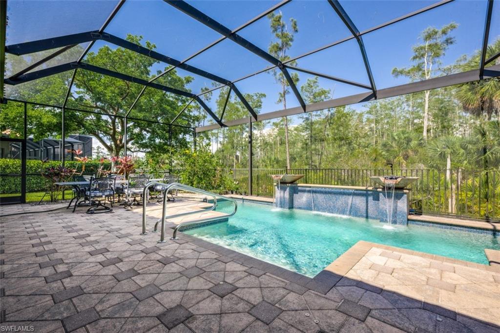 Undisclosed Address Naples, FL 34119 - Photo 32 of 32 a view of backyard with sitting area