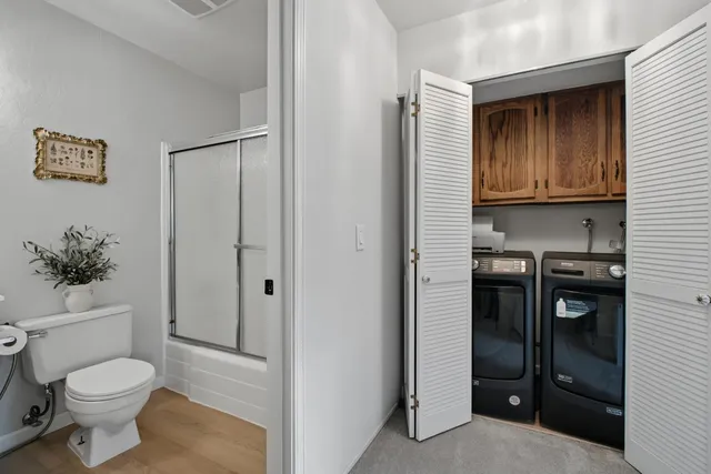 a bathroom with a toilet and a sink