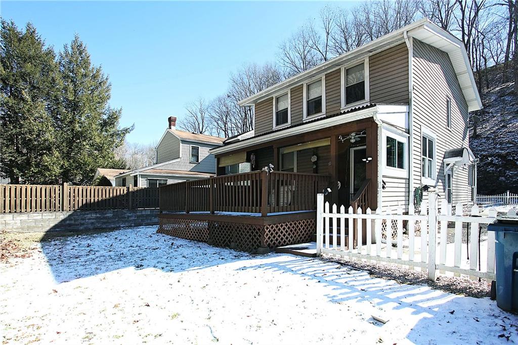 109 Wible Run Road Pittsburgh, PA 15209 - Photo 3 of 19 a front view of a house with a yard