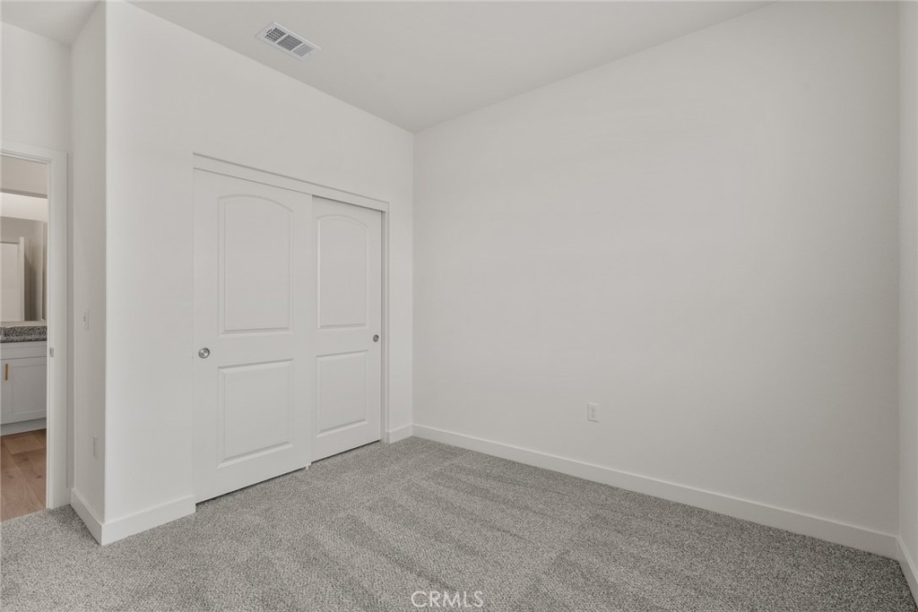 14812 Indigo Street Apple Valley, CA 92307 - Photo 5 of 7 a view of an empty room