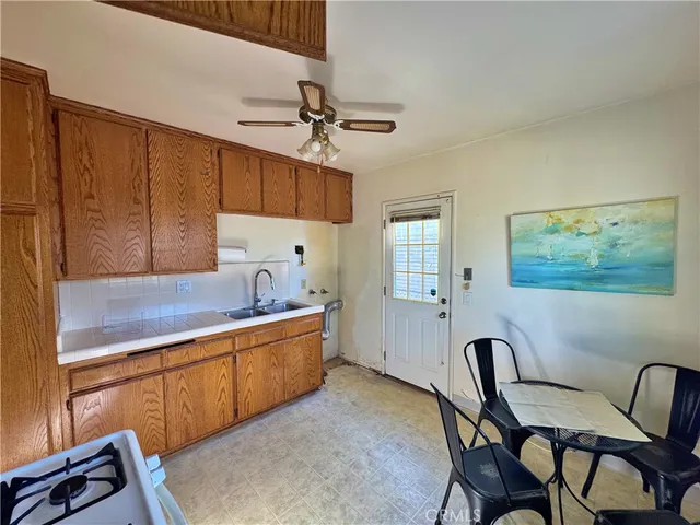 a view of an empty room with glass door