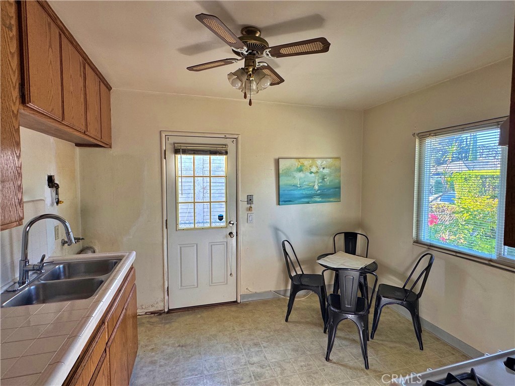 1852 260th Street Lomita, CA 90717 - Photo 19 of 63 a dining room with furniture and window